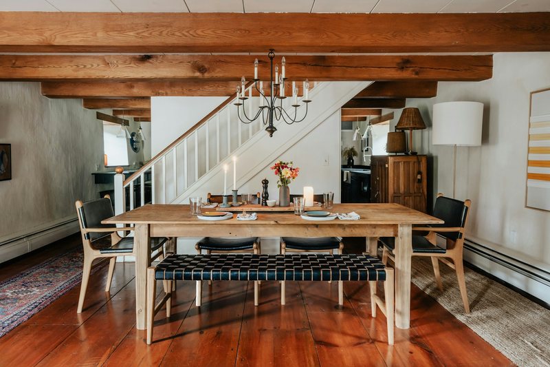 Renovated dining room with exposed beams
