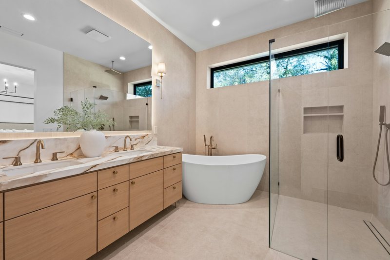 Modern bathroom with freestanding bath and double vanity